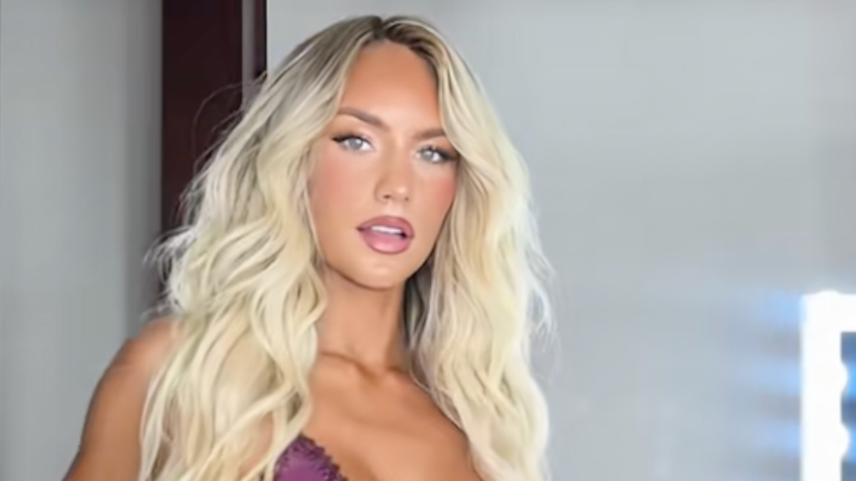 Jaxson Dart's Girlfriend Stuns In Jaw-Dropping Purple Swimsuit Photo