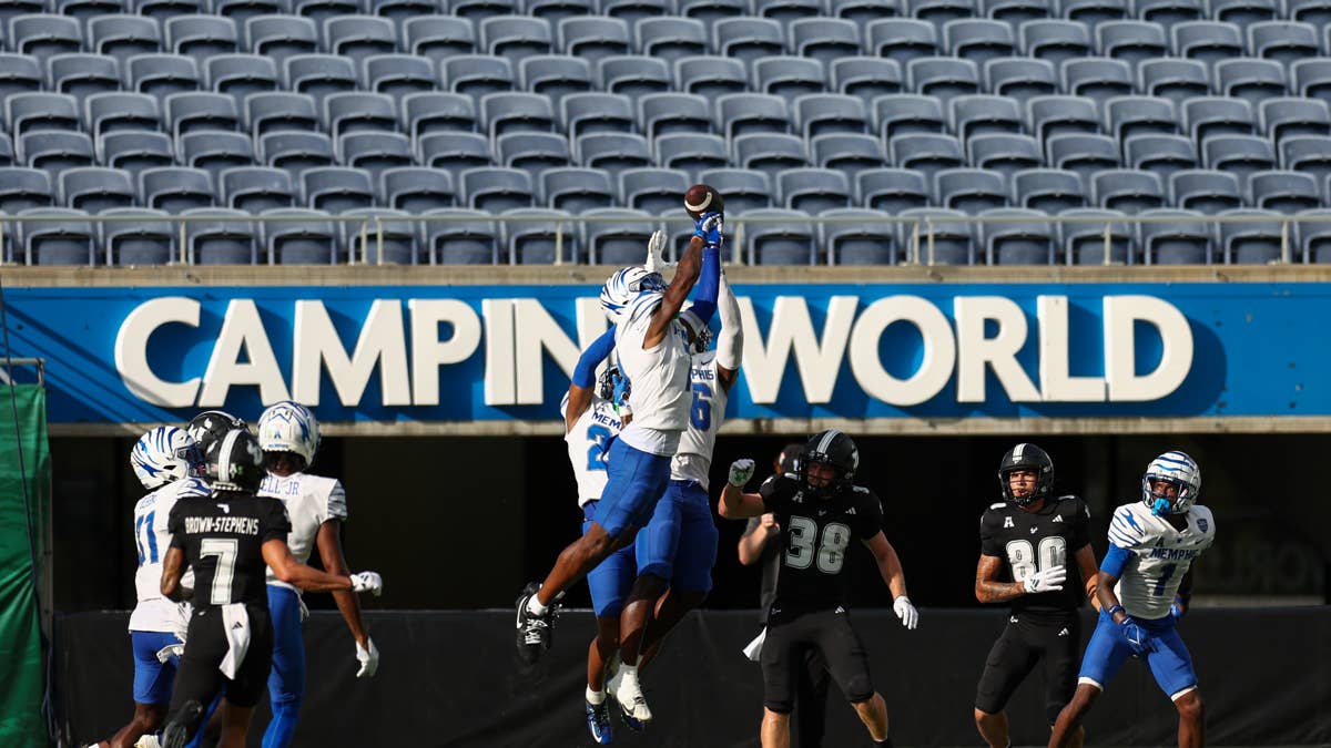 What happens if Christian Gonzalez 'holds in' at Patriots training camp?