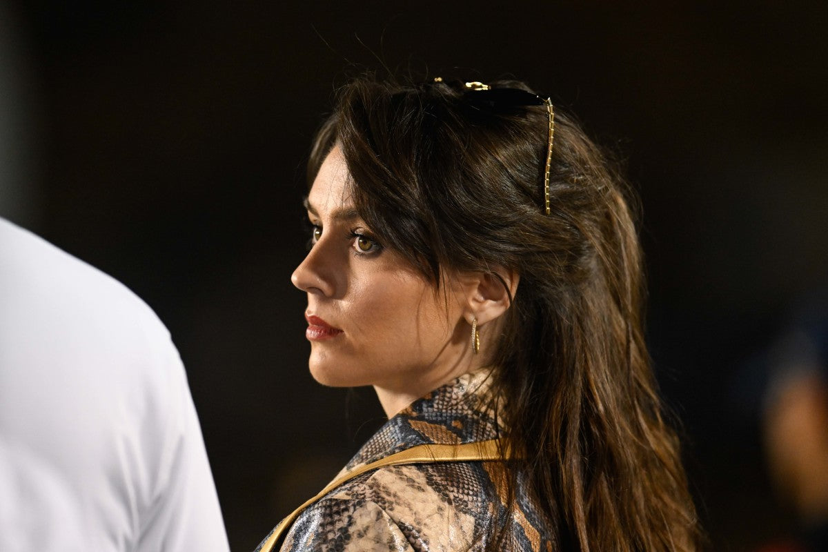 Bill Belichick's Girlfriend Ripped For 'Inappropriate' Outfit At UNC vs. Duke Game
