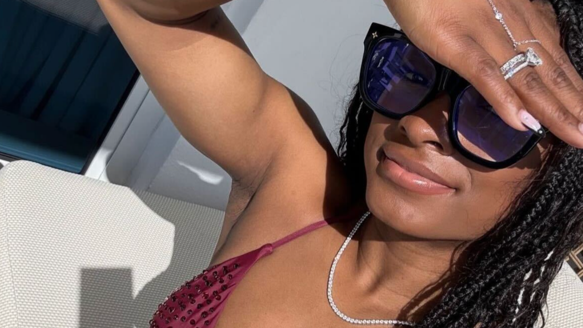 Simone Biles Sends Fans Into Frenzy With Red Swimsuit Photo
