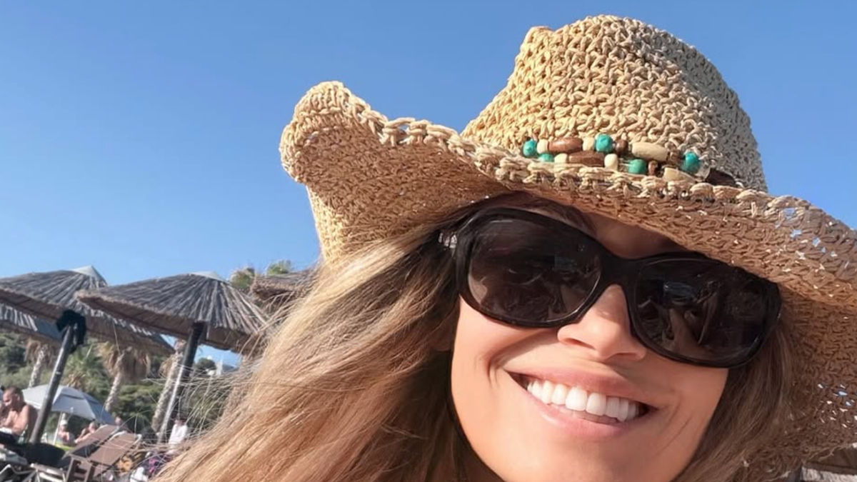 WWE Legend Trish Stratus Sparks Fan Frenzy With Swimsuit Photo At 50