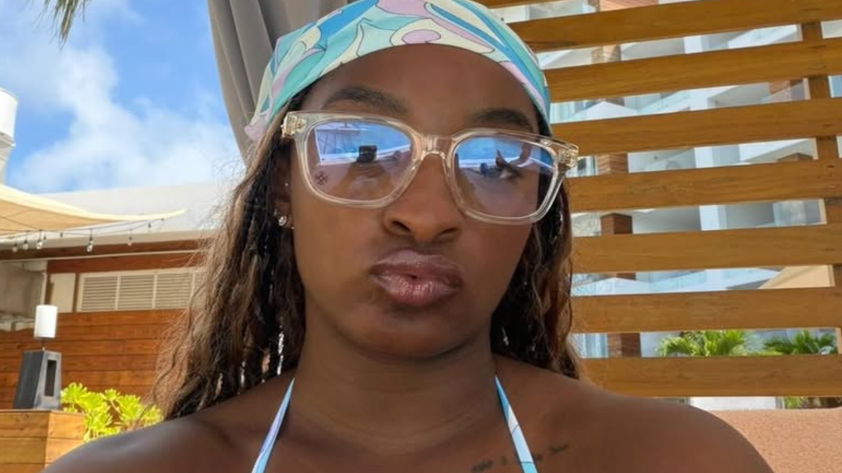 Simone Biles Is 'Saddened' By Criticism Of Her Vacation Photo