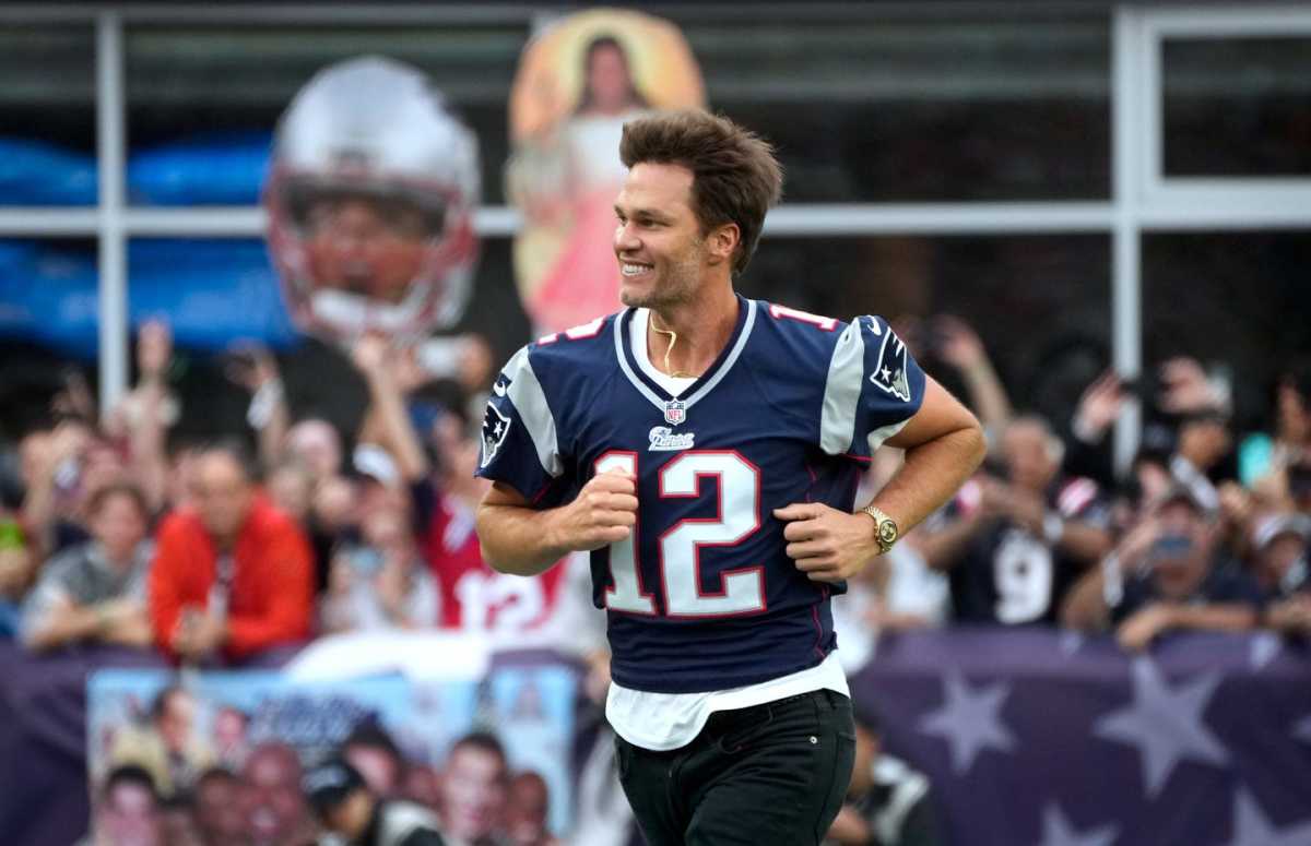 NFL Legend Tom Brady Taunts WWE Stars With Football Claim