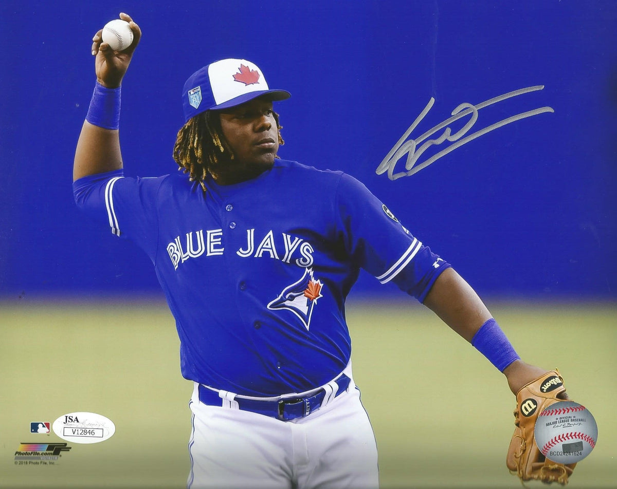 Vladimir Guerrero, Jr. Fielding Toronto Blue Jays Autographed MLB Baseball Photo 1