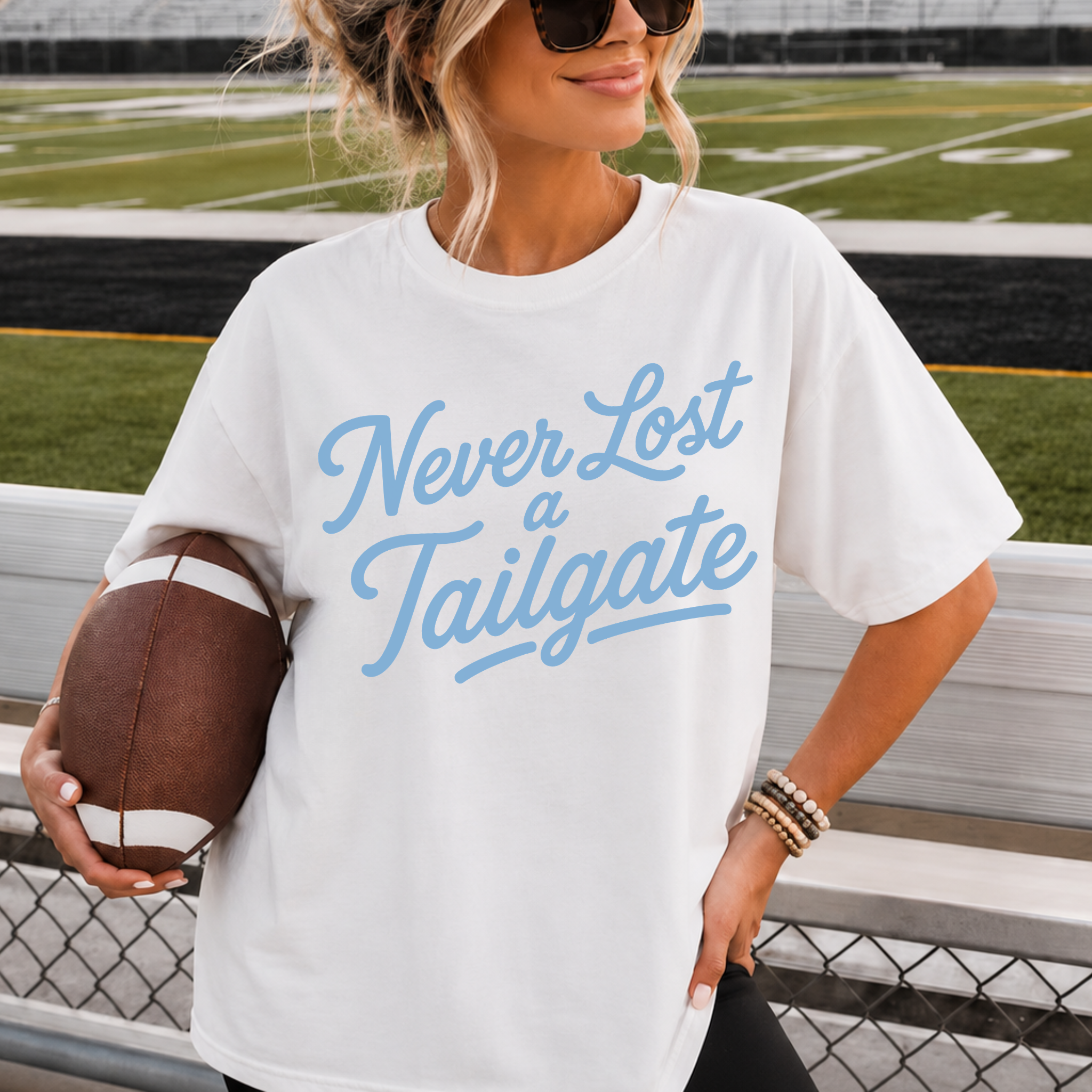 Never Lost a Tailgate Baby Blue Graphic Tee – Carolina Blue Football Game Day Shirt 1